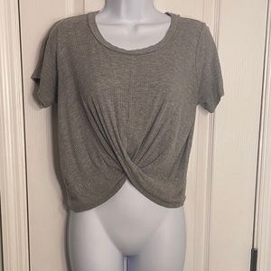 Crop top gray great condition size medium. (Fits bigger) Swoosh in the front